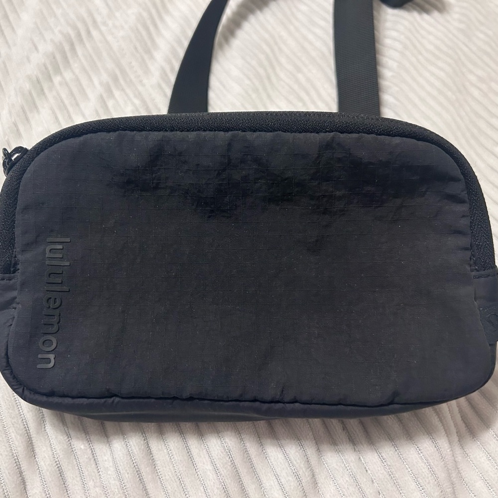 Lululemon black mini belt bag.